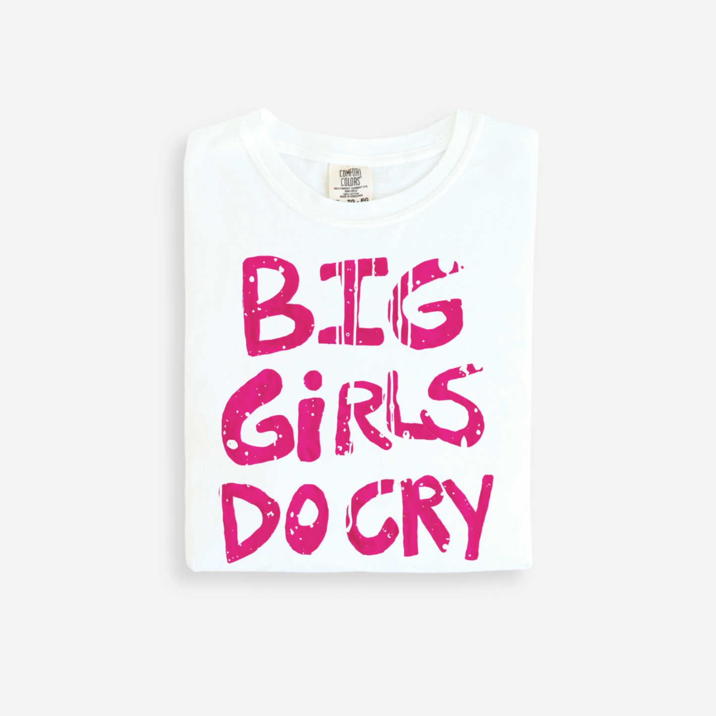 White t-shirt with pink text 'BIG GIRLS DO CRY' on a white background