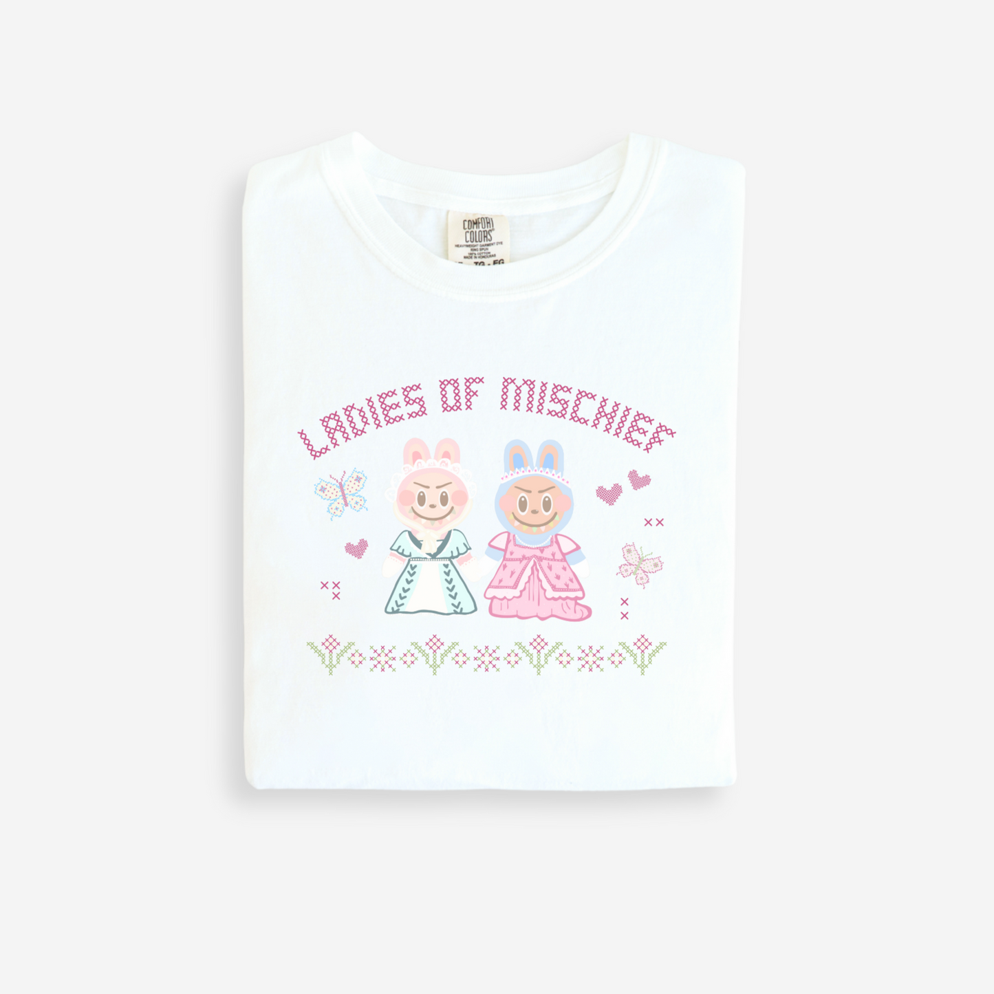 White t-shirt with 'Ladies of Mischief' design on a white background