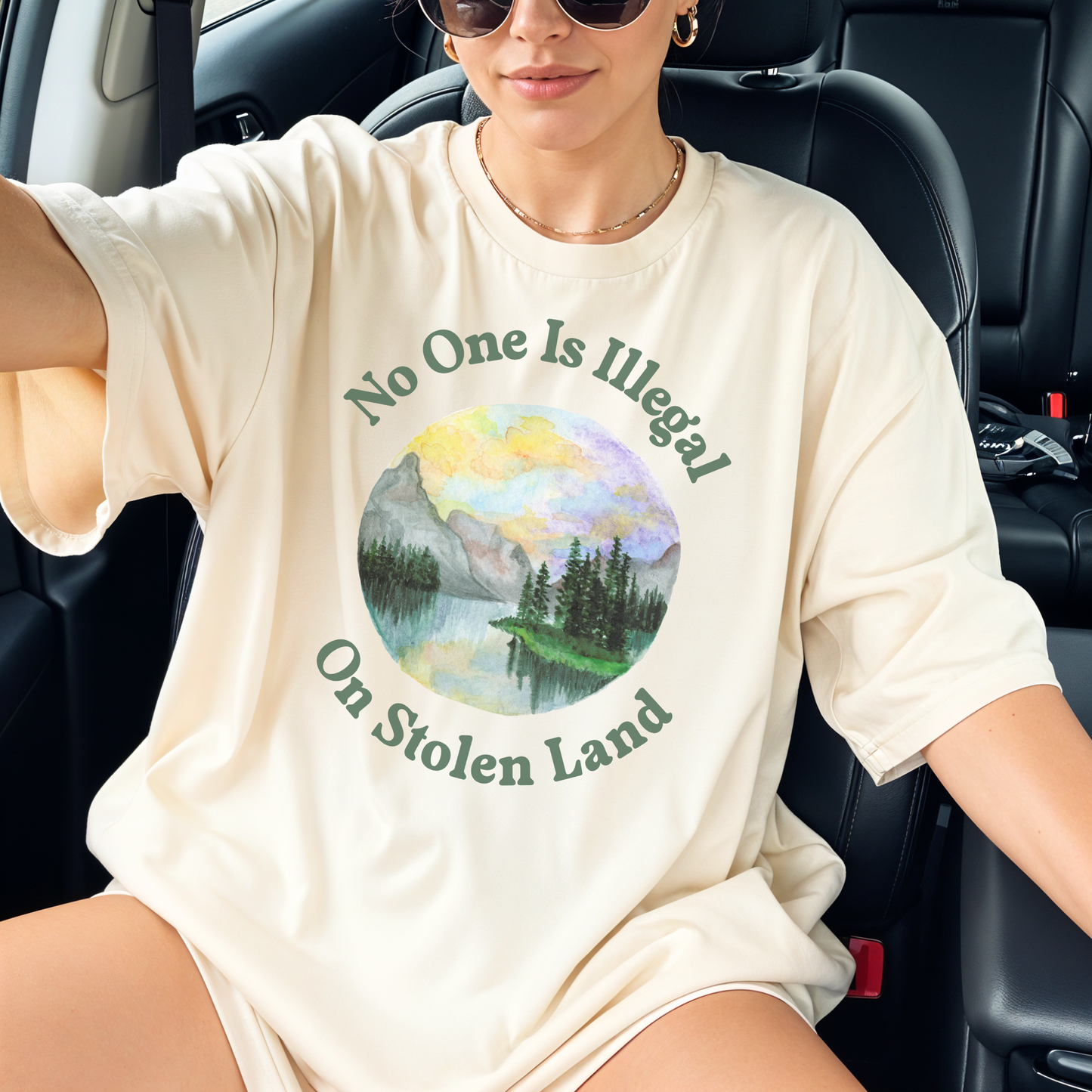 STOLEN LAND PRO-IMMIGRANT Statement Tee