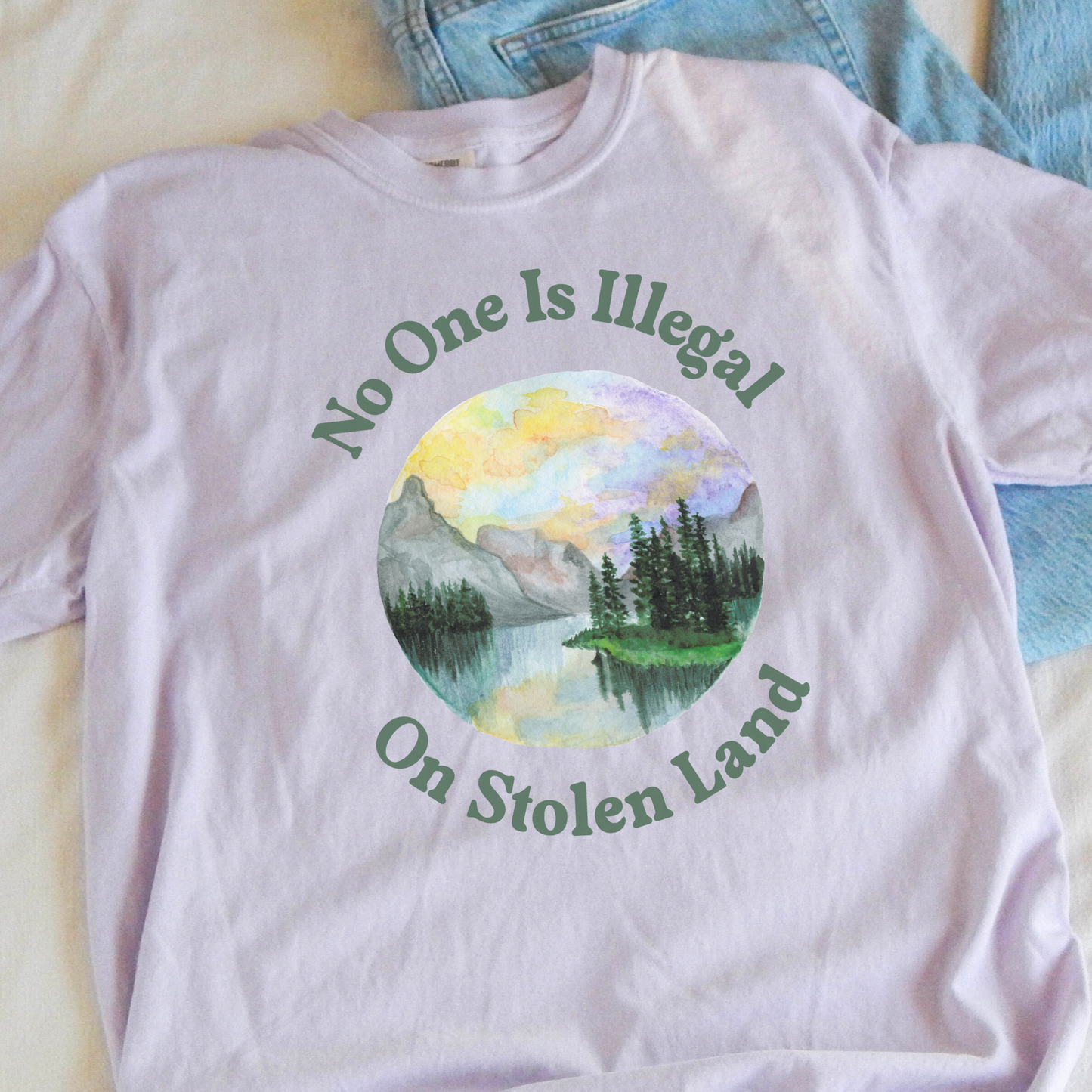 STOLEN LAND PRO-IMMIGRANT Statement Tee