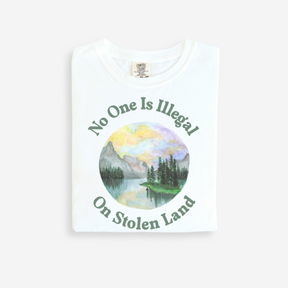 White t-shirt with nature graphic and text on a white background