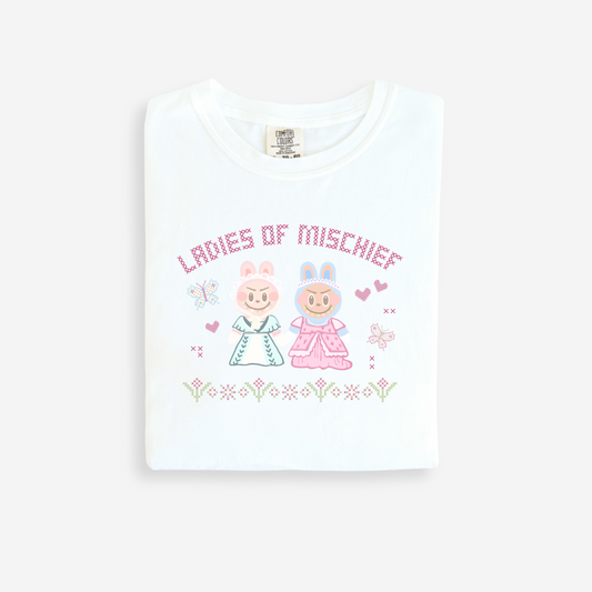 White t-shirt with 'Ladies of Mischief' design on a white background